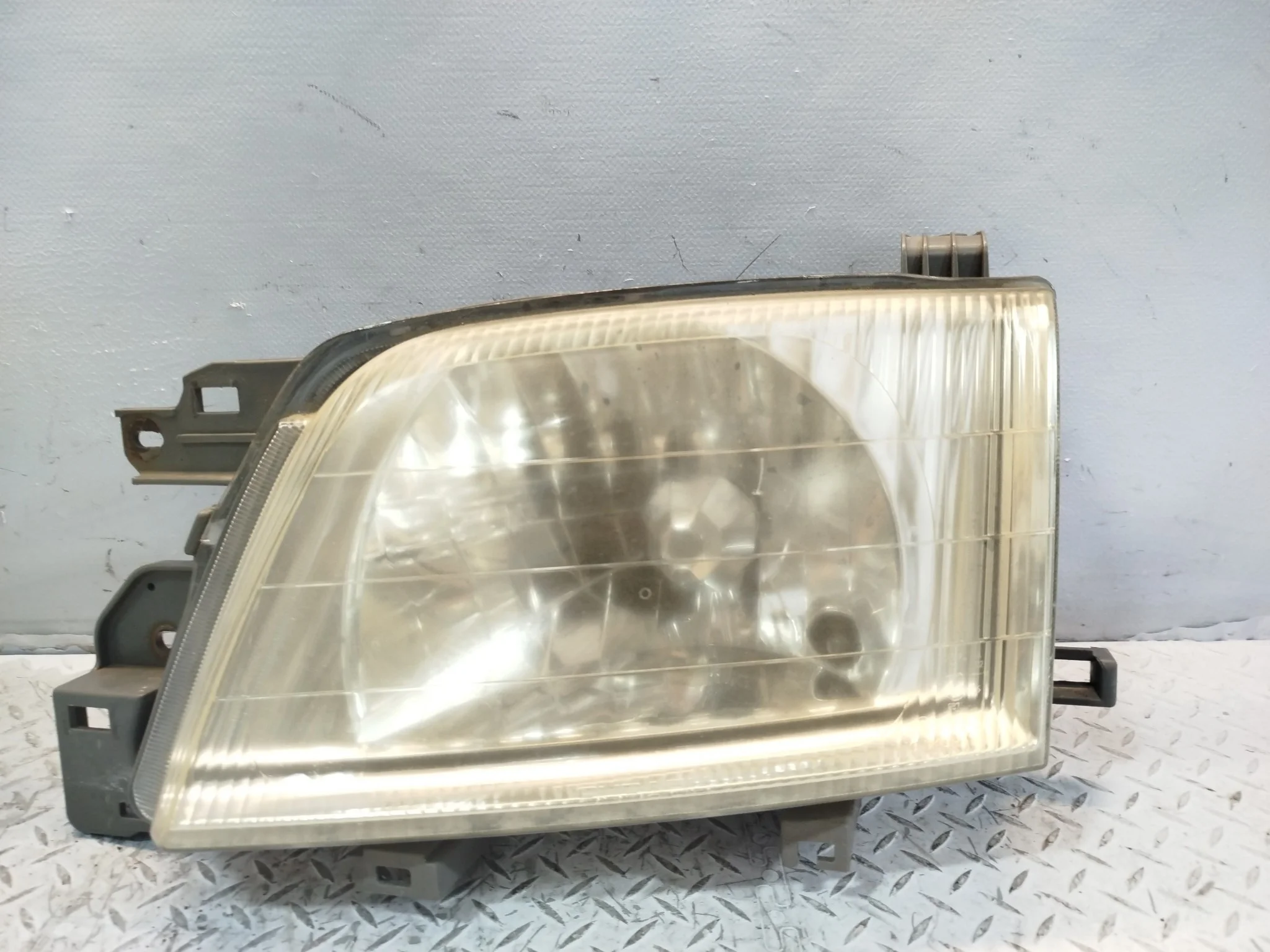 ФАРА SUBARU ЛЕВАЯ 84001FC250 XA7470