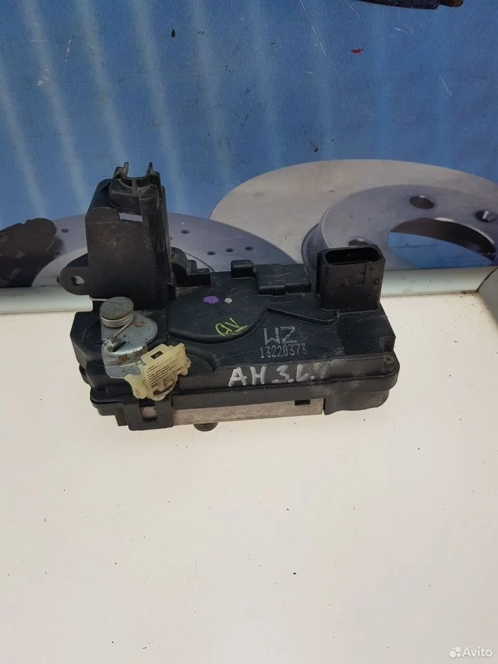 Замок двери задний левый opel zafira b astra h