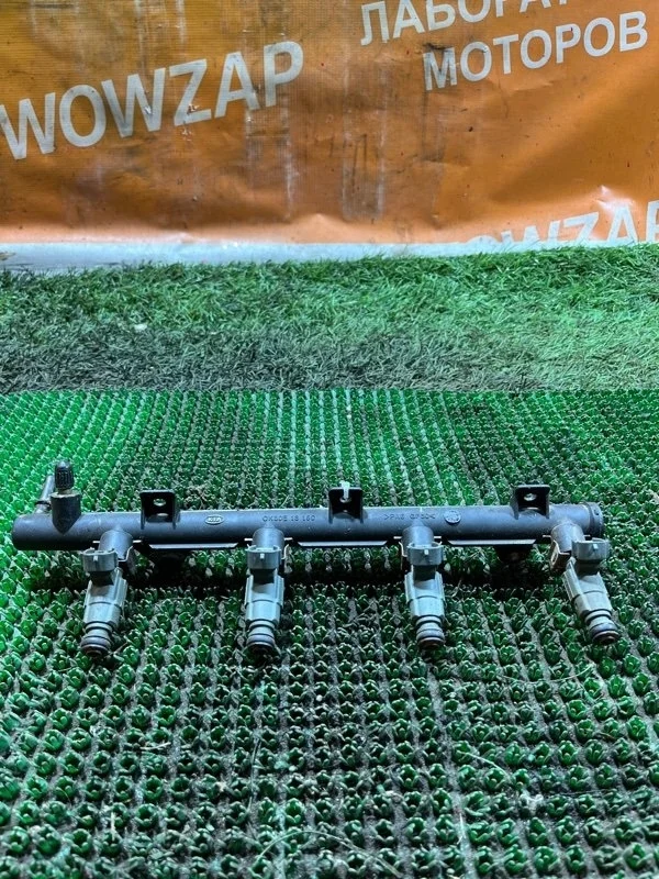 Топливная рейка Kia Spectra 0K30E13150 S6D