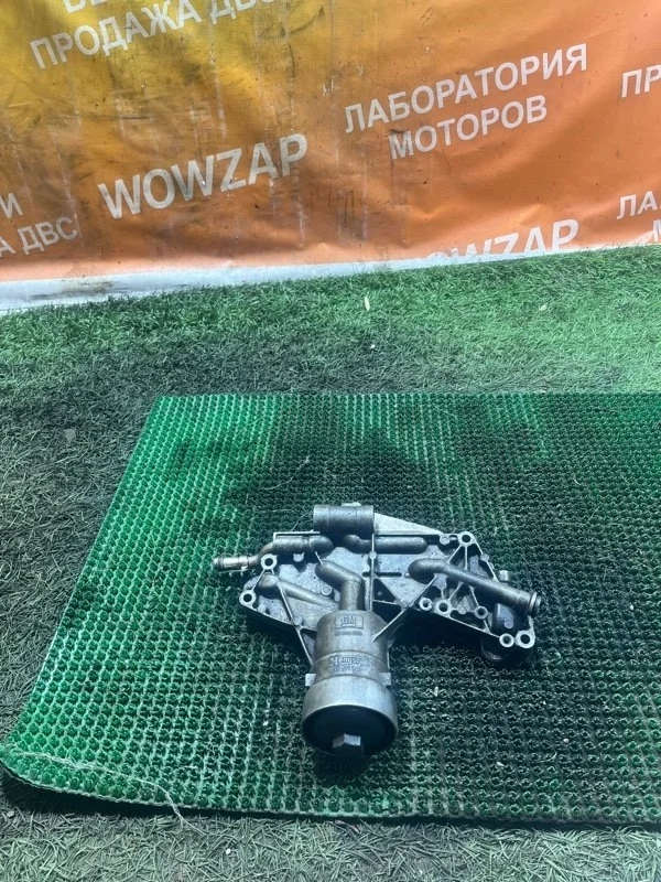 Корпус масляного фильтра OPEL Astra 55355601 J A16LET