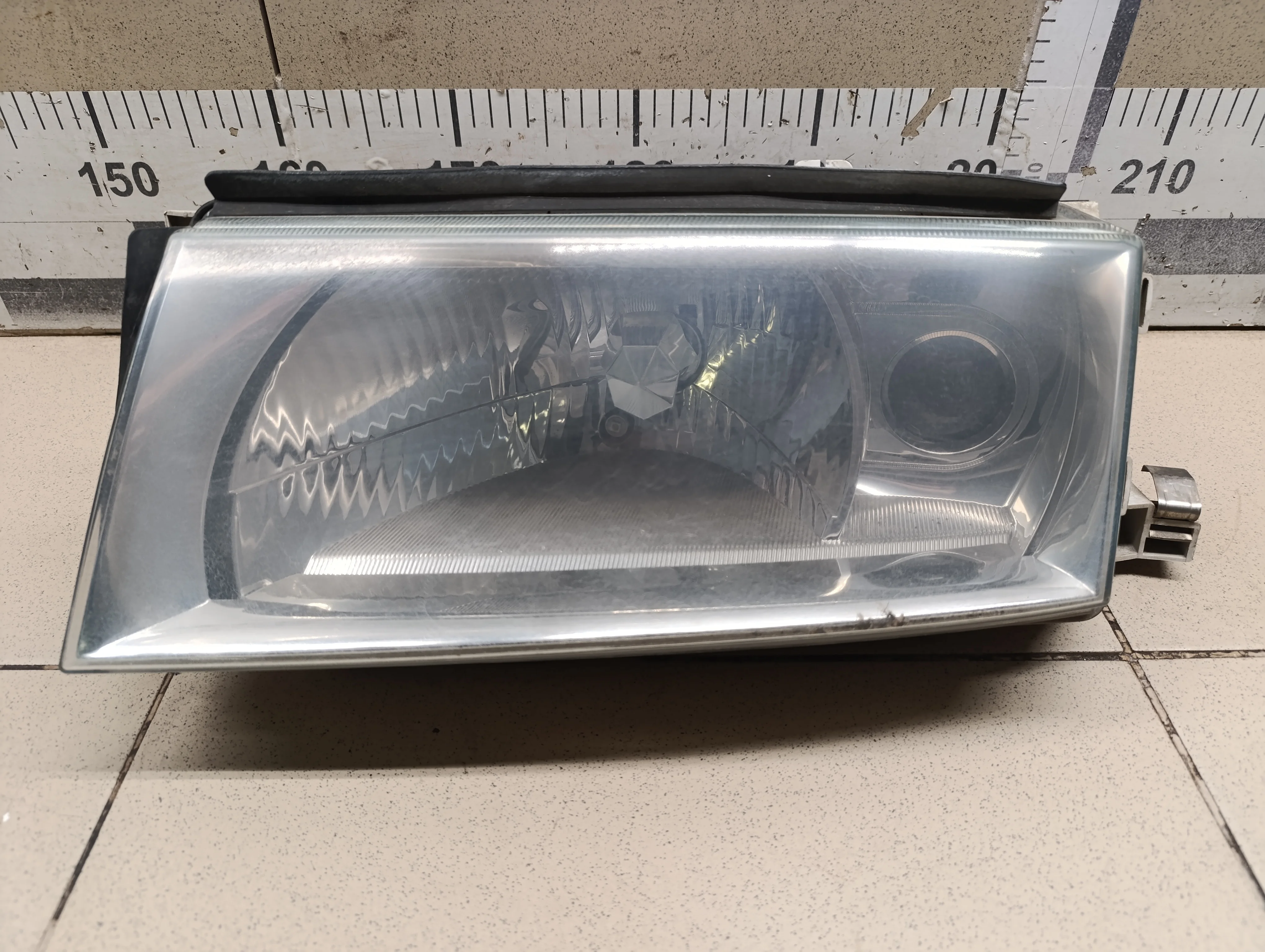 Фара левая Octavia (A4 1U-) 2000-2011