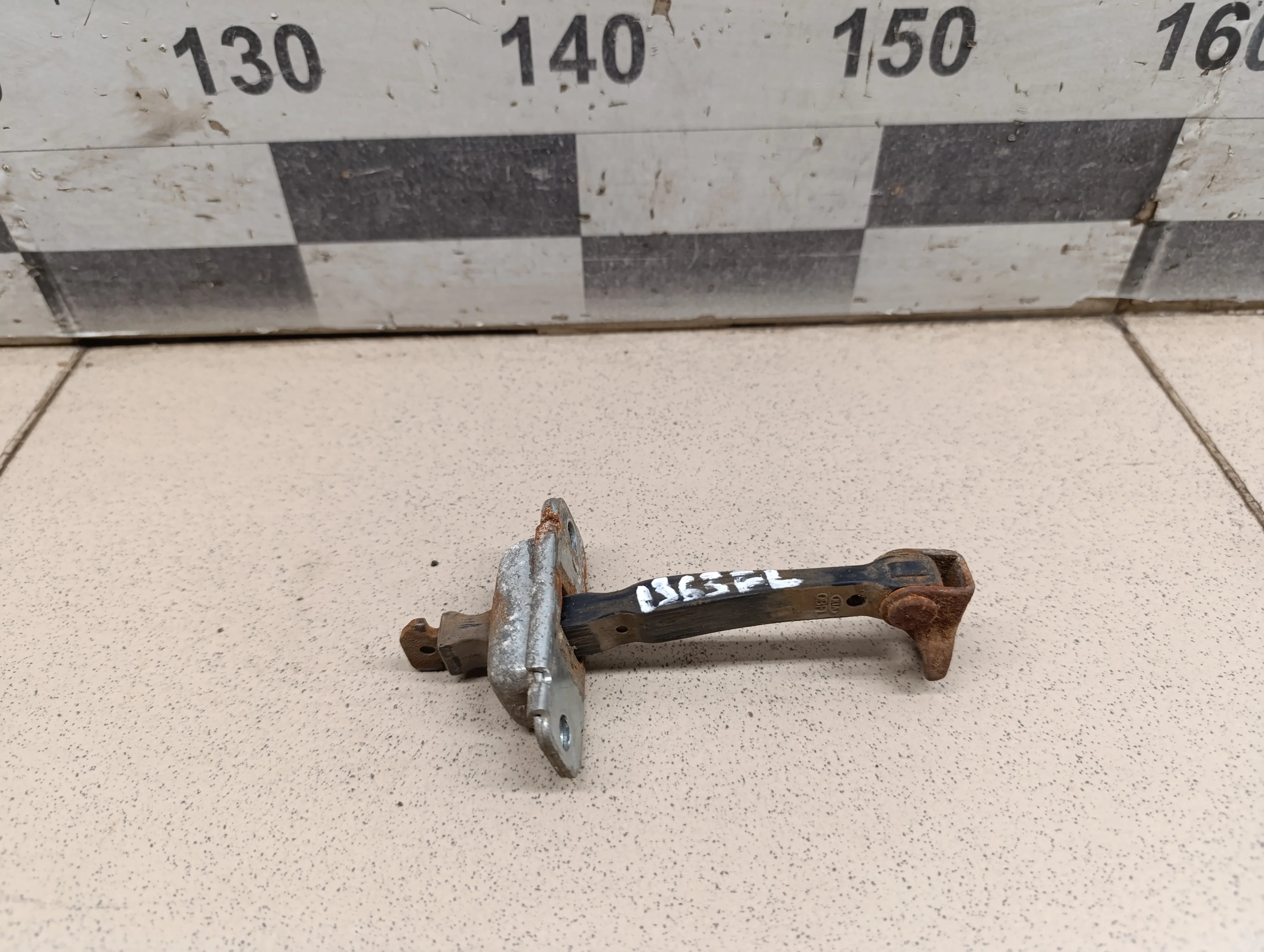 Ограничитель двери RIO 2011-2017