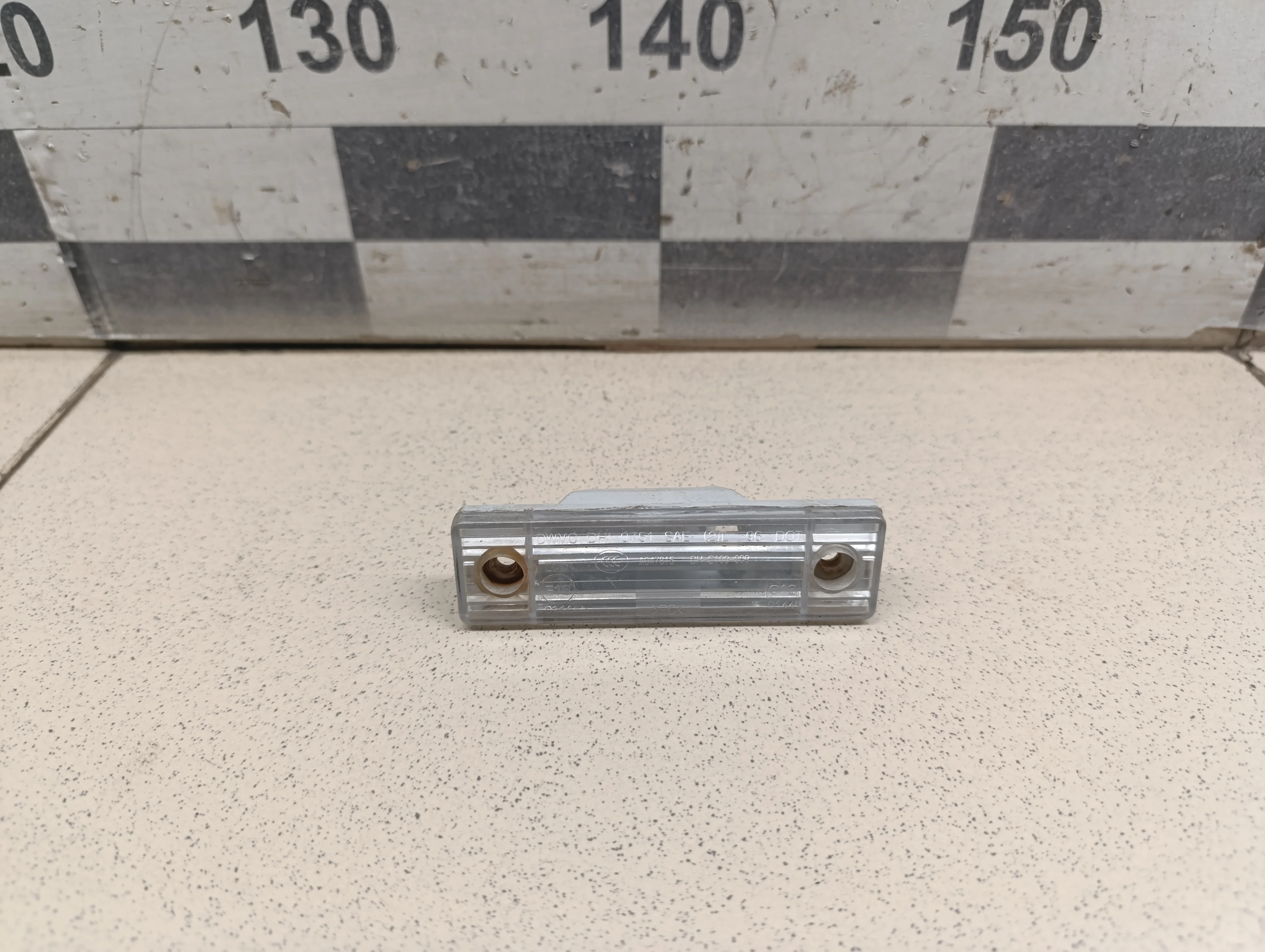 Фонарь подсветки номера Aveo (T200) 2003-2008