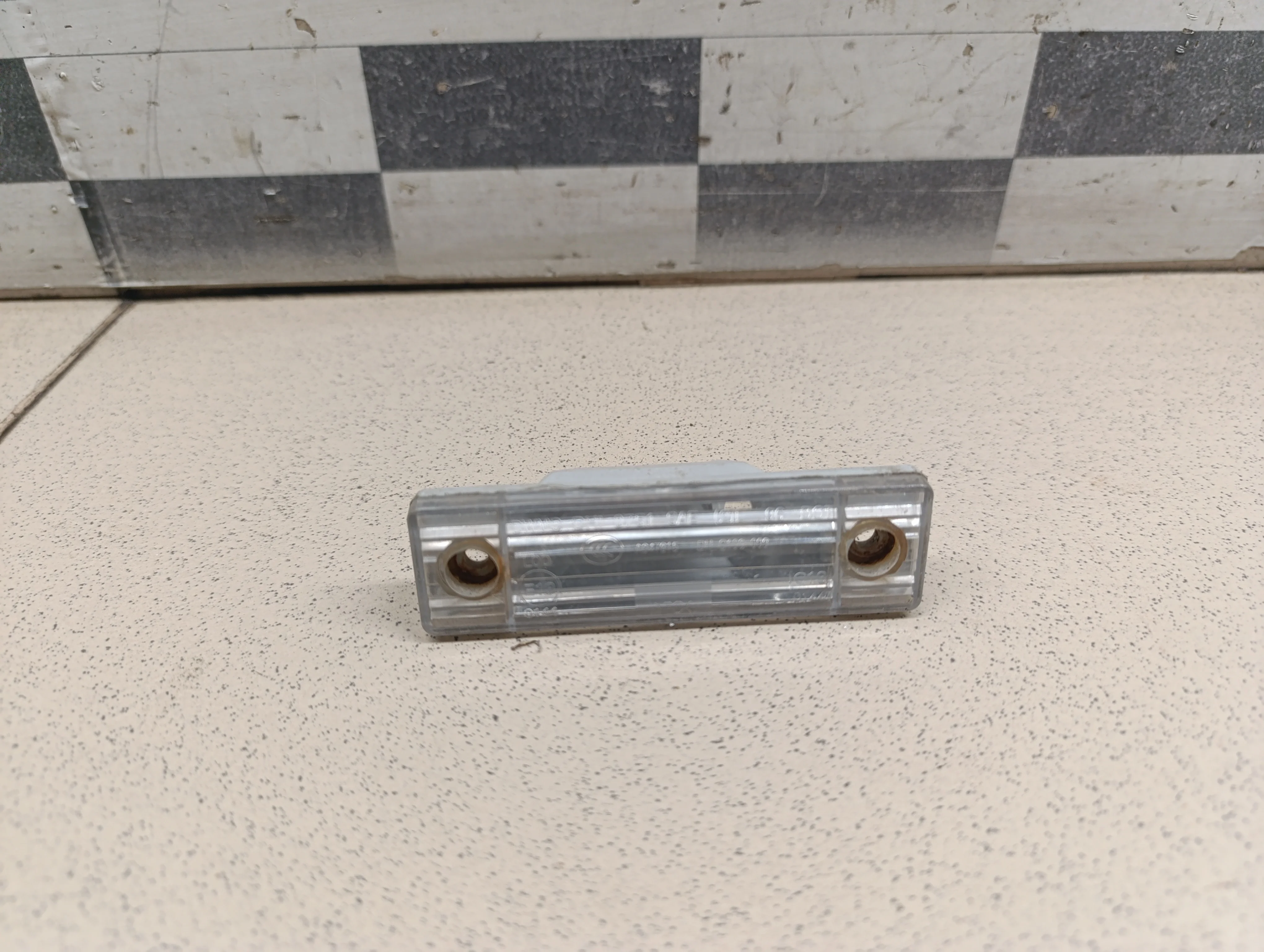 Фонарь подсветки номера Aveo (T200) 2003-2008