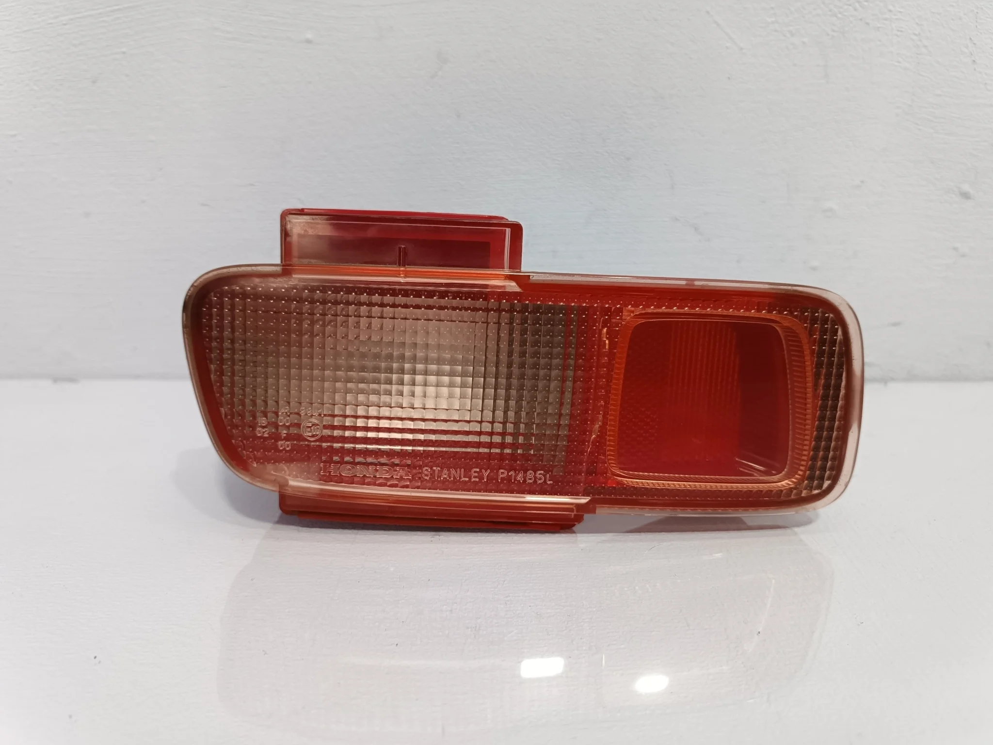 ФОНАРЬ ЗАДНЕГО ХОДА HONDA ЛЕВЫЙ 34451S7A003