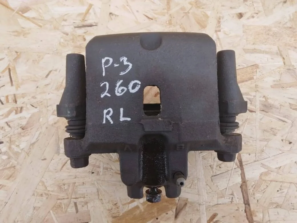 Суппорт Mitsubishi Pajero 3 задний левый