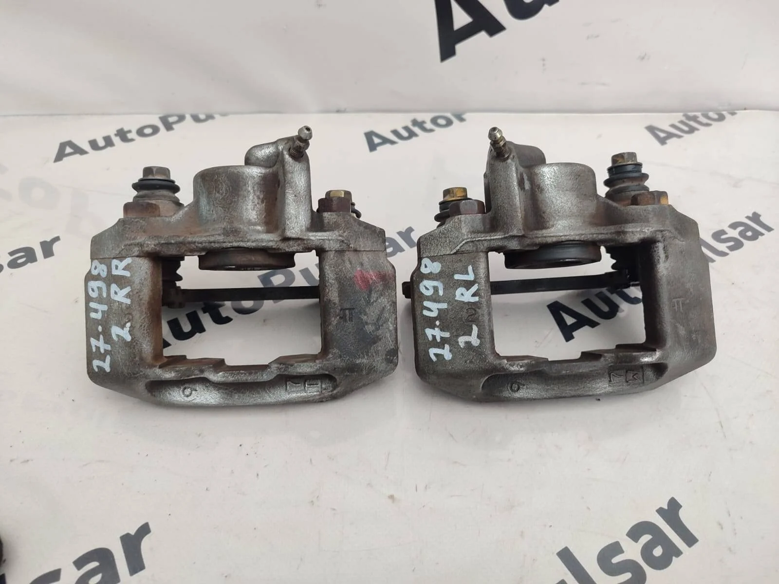 Суппорт Mitsubishi Pajero Sport K9 задний к-т Оригинал