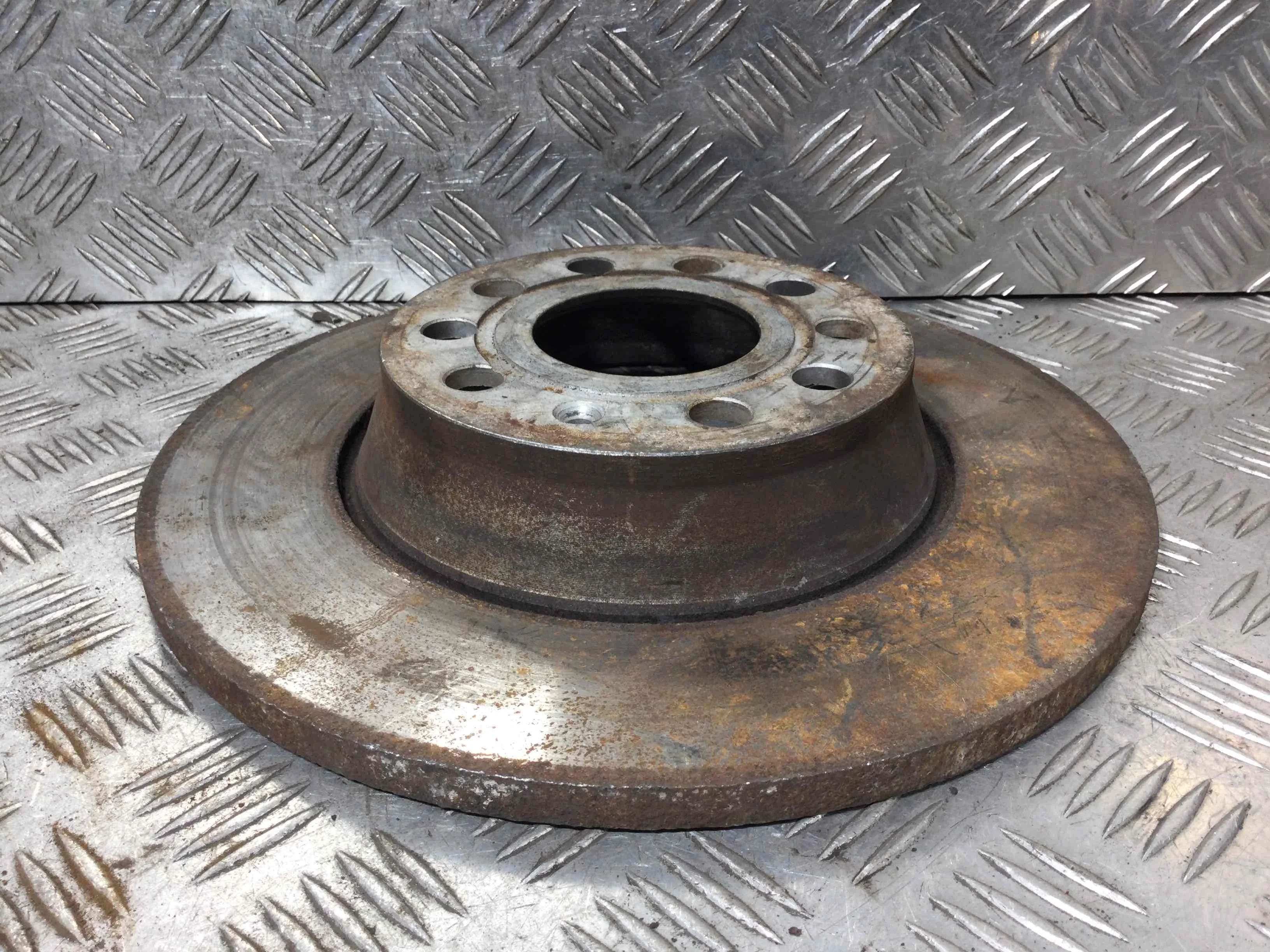 Диск тормозной задний Volkswagen Passat B6 (2005-2010) бензин 1.8  Механика