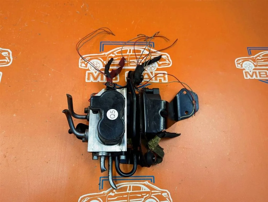 Блок клапанов гидроподвески Mercedes-Benz