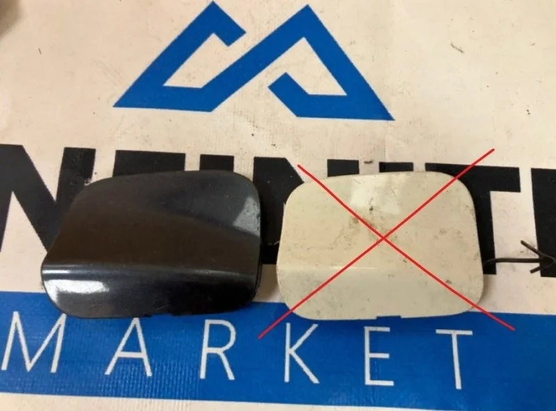 Заглушка буксировочного крюка бампера передняя