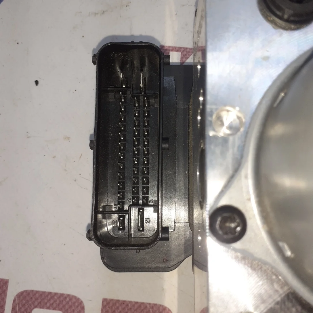 Электрогидравлический блок абс Уценка Уценка. Новый. Поврежен корпус электрической части.