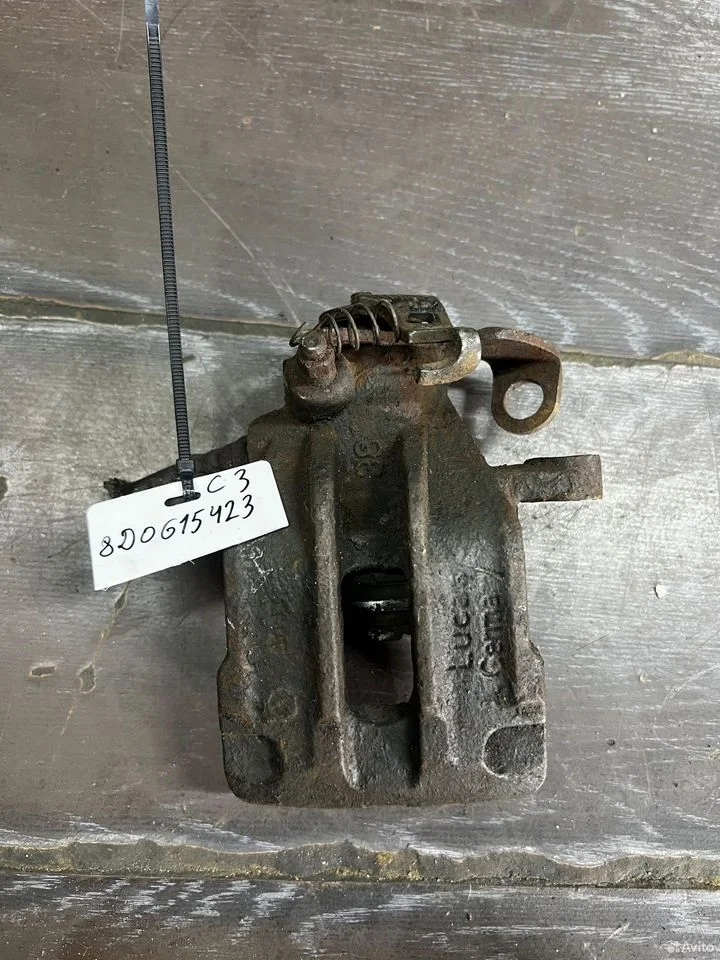 Суппорт тормозной задний левый vag 8d0615423