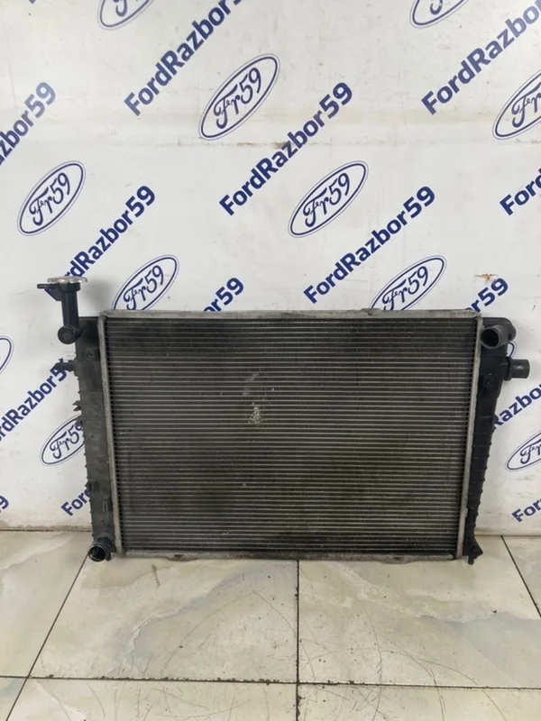 Радиатор ДВС Kia Sportage 2006 253102E100 KM