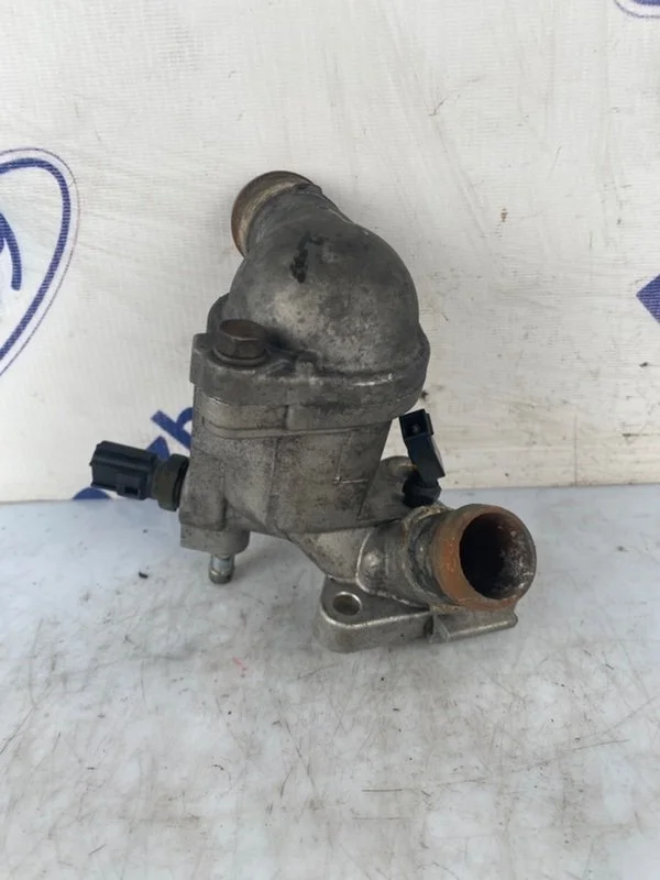 Корпус термостата Mitsubishi Lancer 9 2004 MD358257 CS3A 1.6 (4G18)