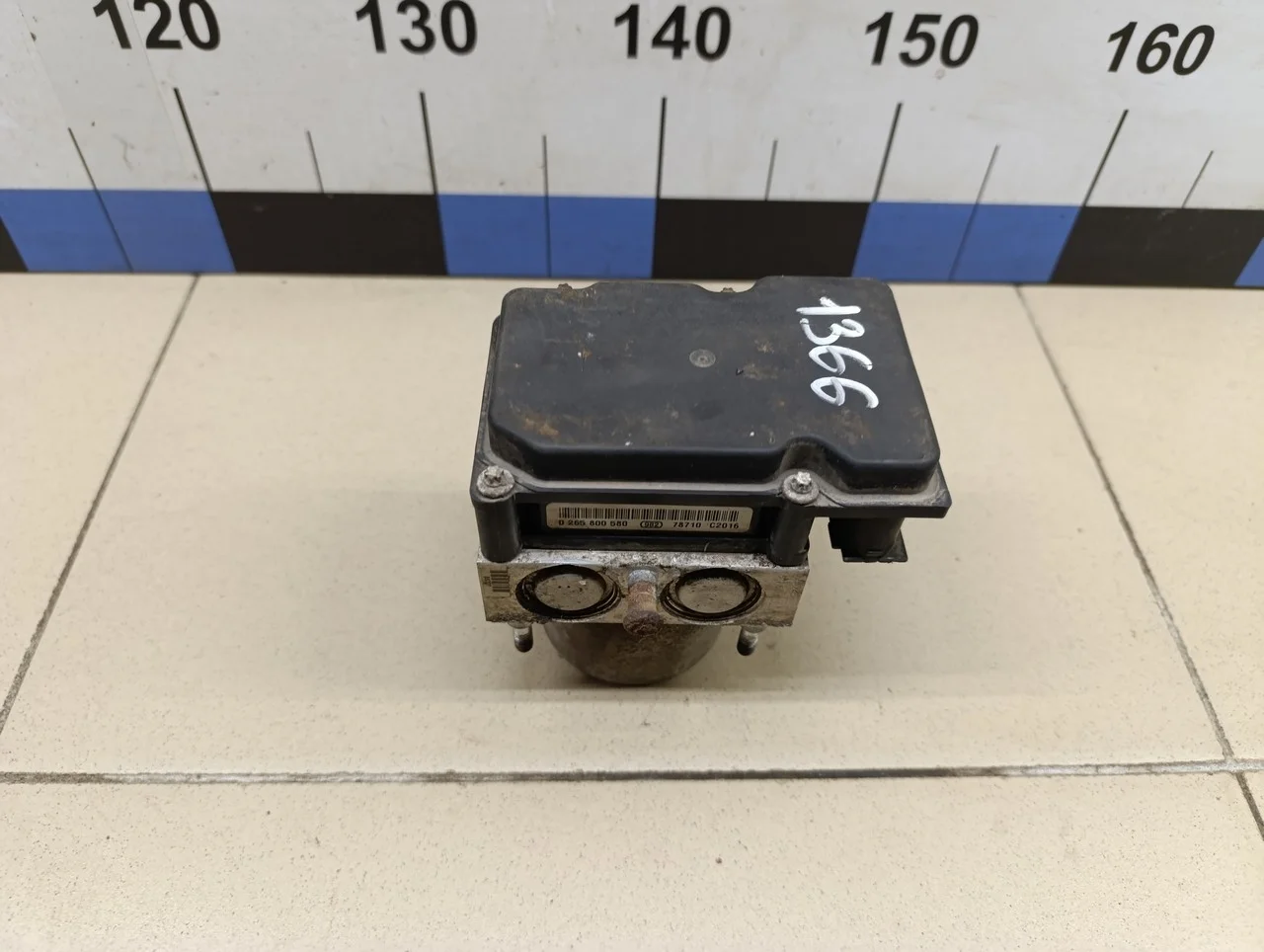 Блок ABS (насос) Tiida (C11) 2007-2014