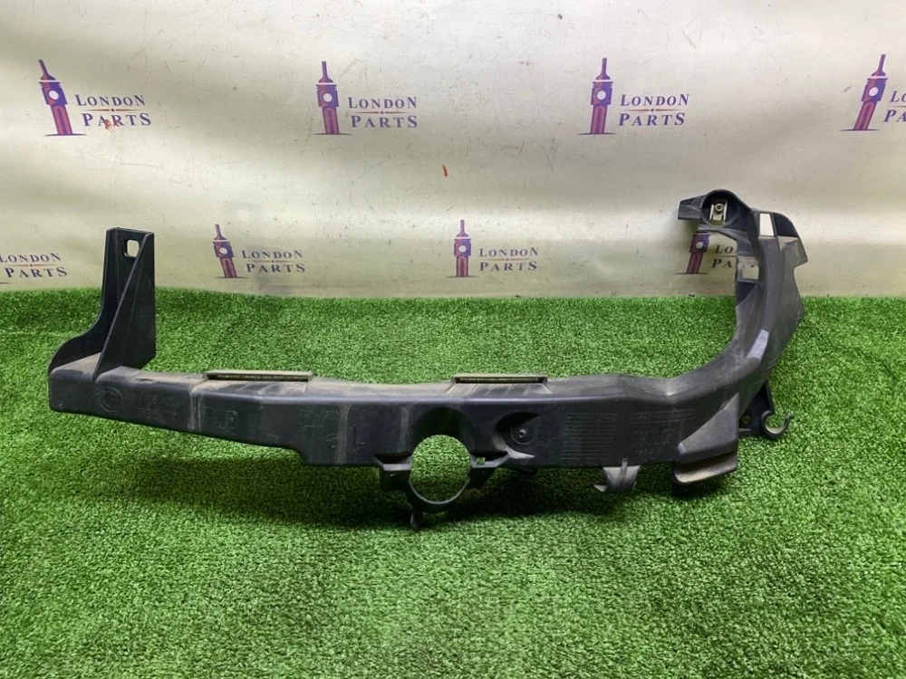 Кронштейн крепления фары BMW E90