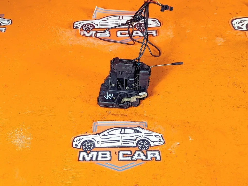 Замок двери передней левой Mercedes-Benz