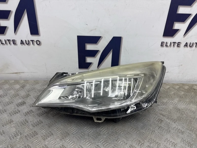 Фара Opel Astra 2012 13253646 J 1.4, левая