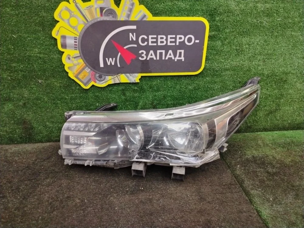 Фара Toyota Corolla 2013 8117002E70 180 1ZRFE, левая
