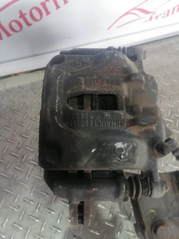 Суппорт тормозной Renault Trafic 7701050919 2, передний левый