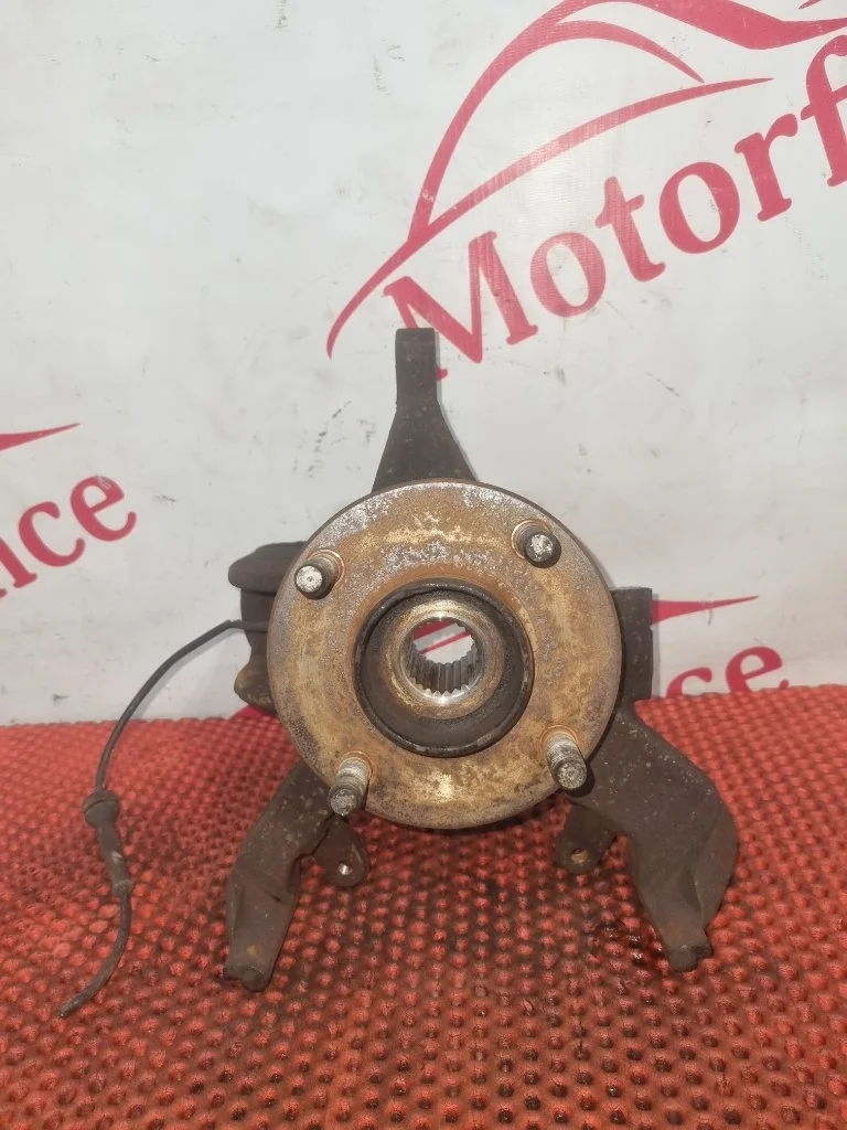 Кулак поворотный Ford Focus 1079001 1, передний левый