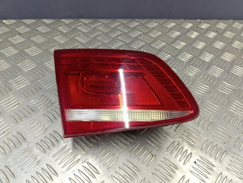 Фонарь в крышку багажника левый volkswagen Passat 2012 3AE945307C B7 CAXA