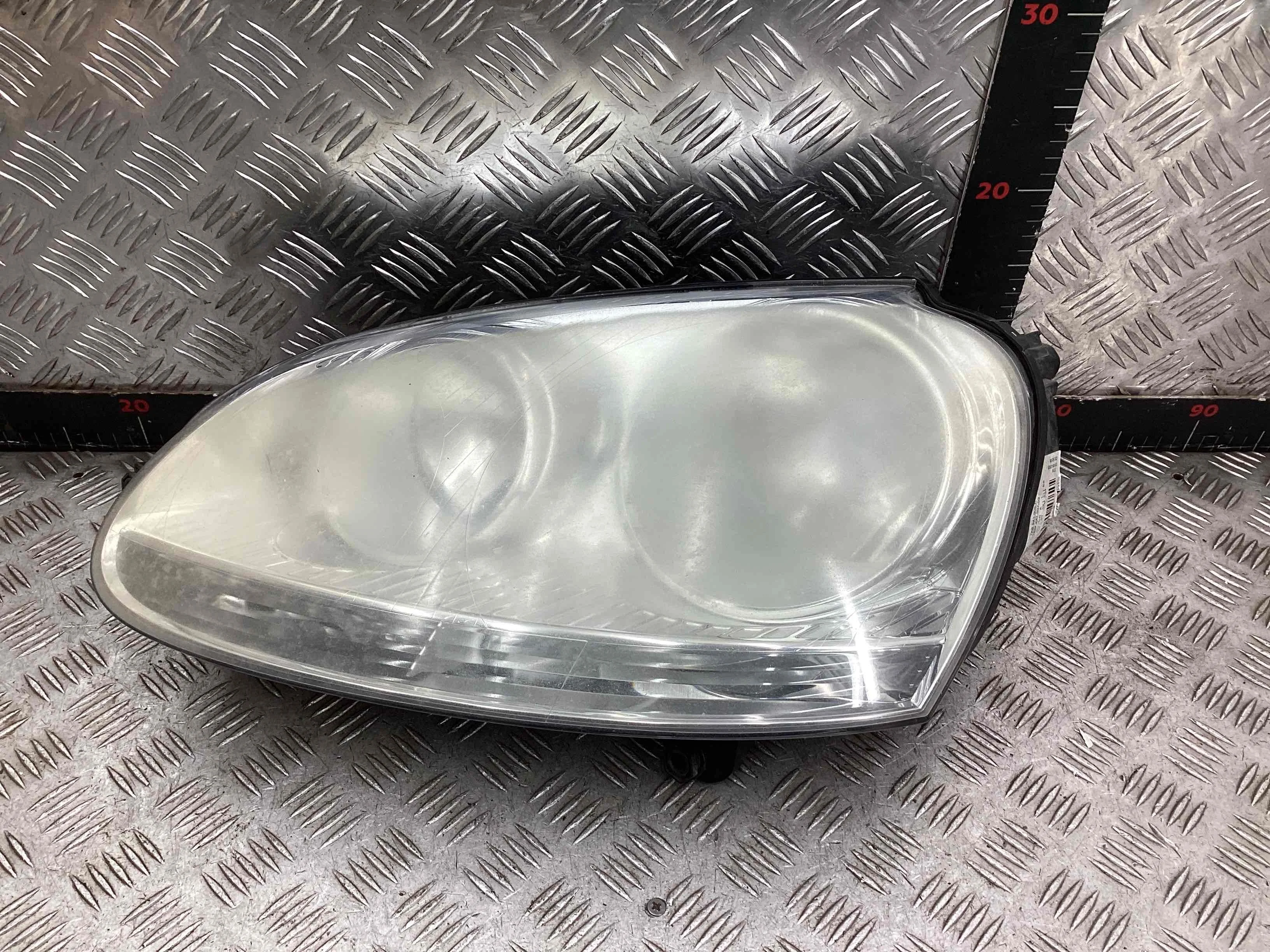 Фара левая Volkswagen Golf Golf V (1K) 2004-2009 2006 1,4 i Бензин МКПП 5ст. Хэтчбек 3дв.