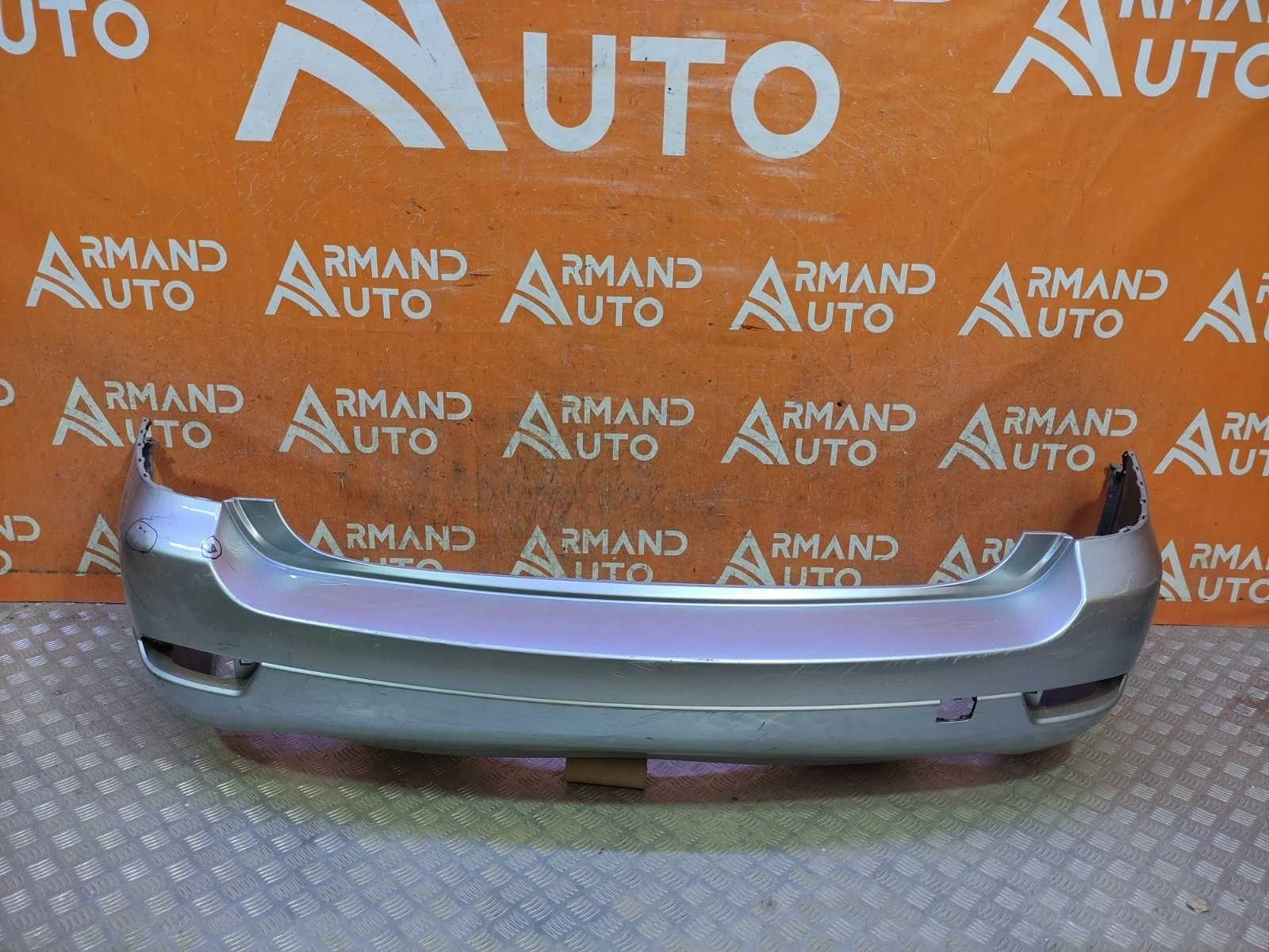 Бампер Subaru Tribeca 2007-2014 57704XA04A W10, задний