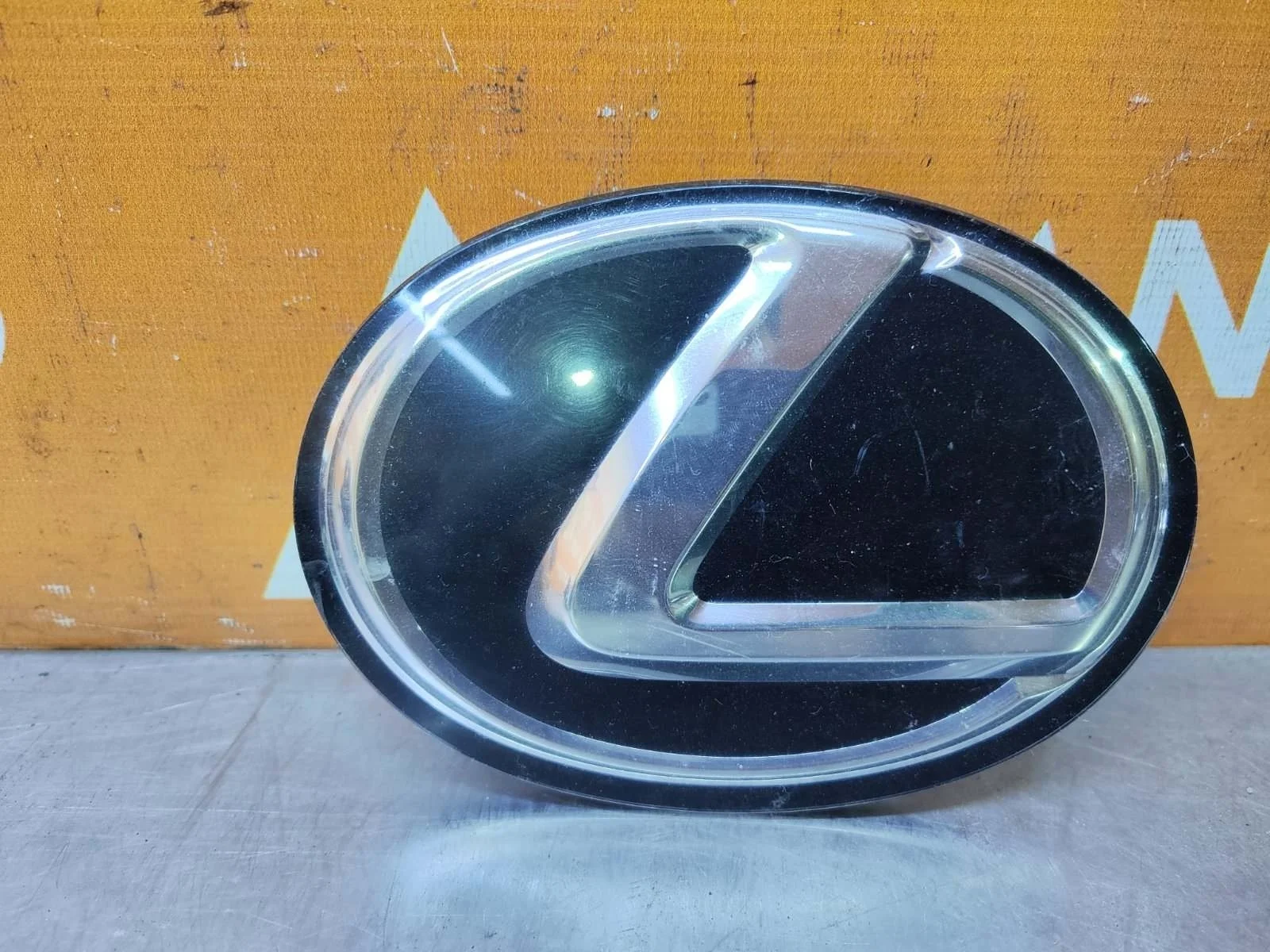 Эмблема Lexus NX 2017-2021 9097502108 1, передняя