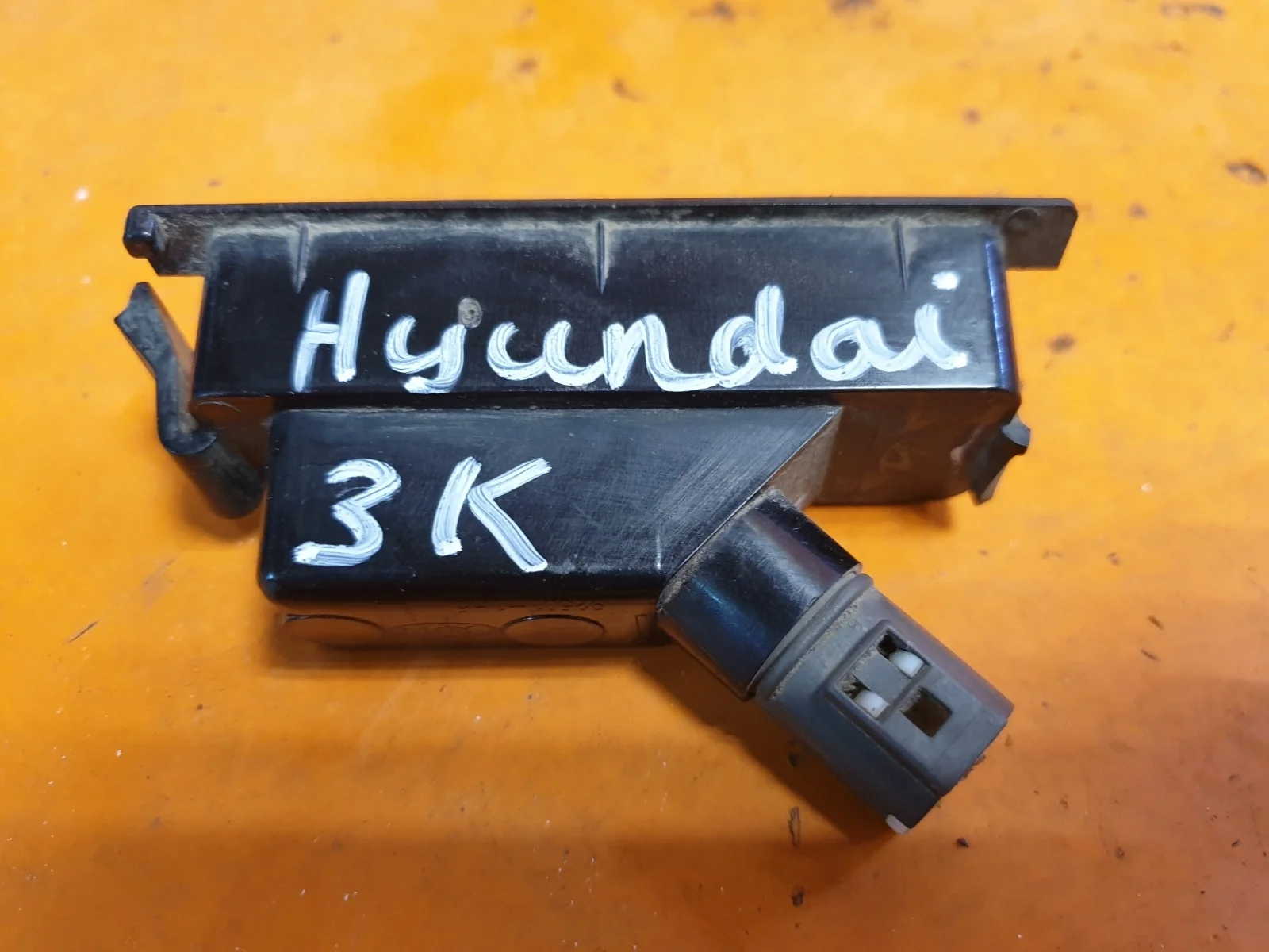 Фонарь подсветки гос номера HYUNDAI Solaris 2010-2017 925011H500 1, левый