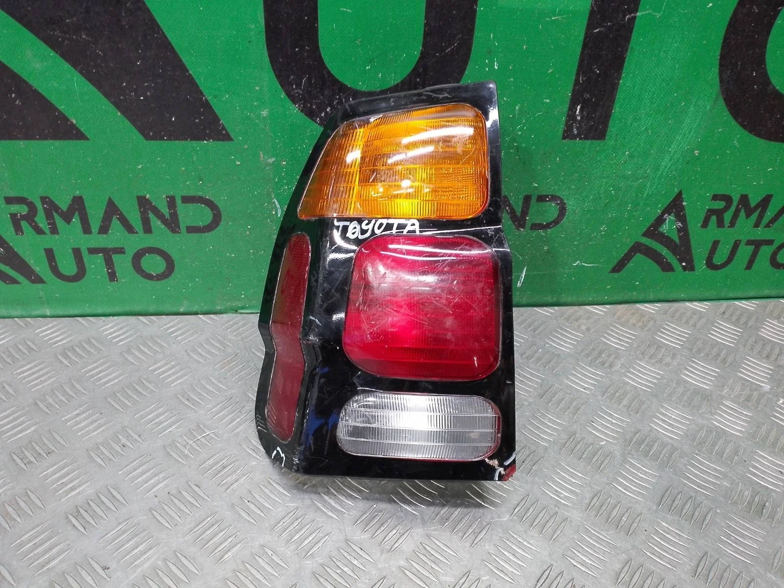 Фонарь Mitsubishi Pajero Sport 1998-2004 MR496373 1, левый
