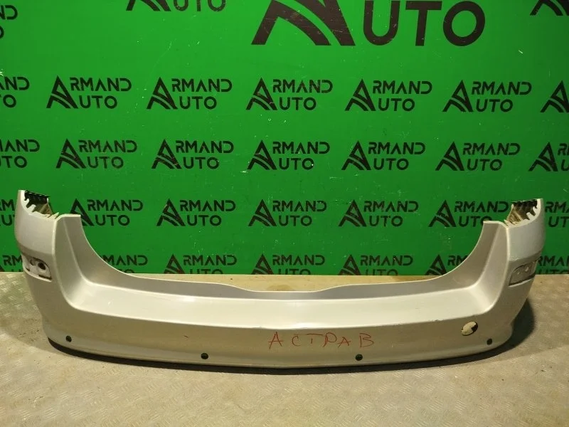 Бампер Opel Astra 2004-2014 13156942 H, задний