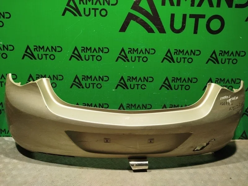 Бампер Opel Astra 2009-2012 13348049 J, задний