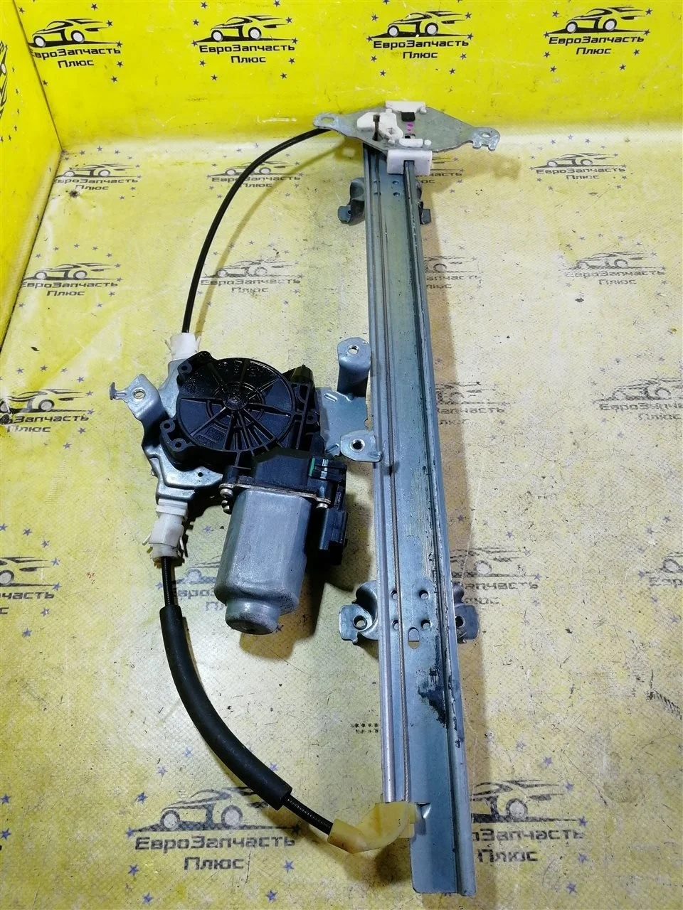 Стеклоподъемник Nissan Note 807019U100 E11, передний левый