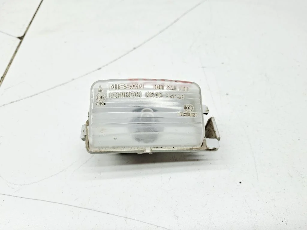 Фонарь подсветки номера Nissan Tiida C11