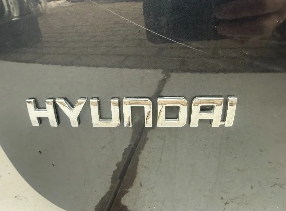 Эмблема Hyundai Santa Fe II (2005—2010)