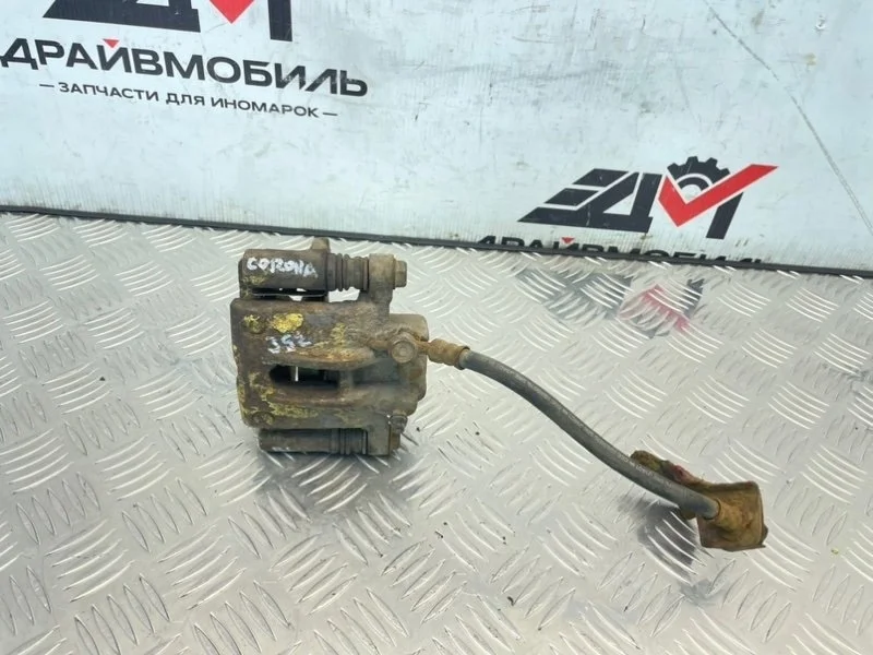 суппорт тормозной toyota corolla 2005 ZZE120 4ZZFE