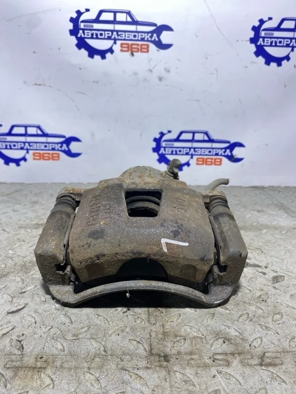 Суппорт тормозной Daewoo Nexia 2010 96212321 A15SMS, передний левый