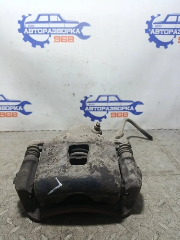 Суппорт Daewoo Nexia 2004 96212321 N100 A15MF, передний левый