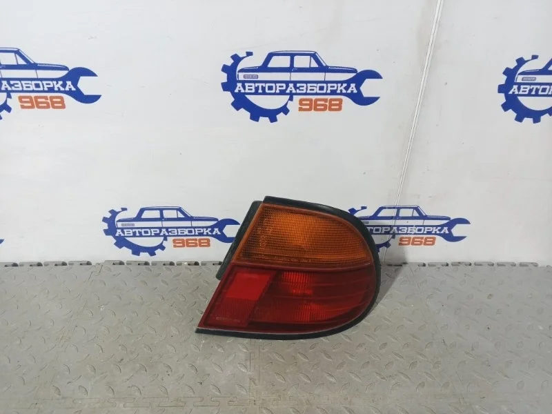 Фонарь Nissan Almera 1997 265540N827 N15 GA16, правый