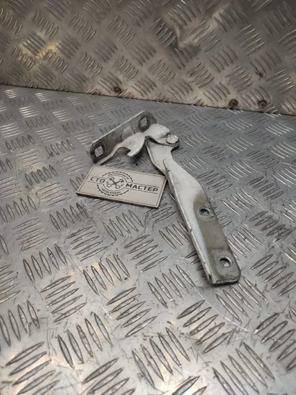 Петля капота левая Fiat Doblo