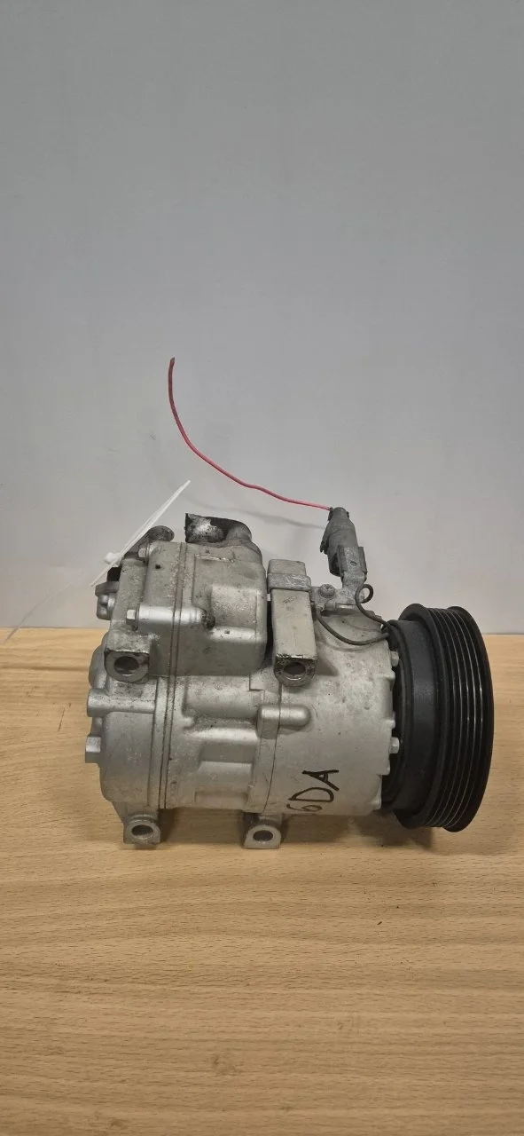 Компрессор кондиционера Kia Opirus 977013K220 G6DA