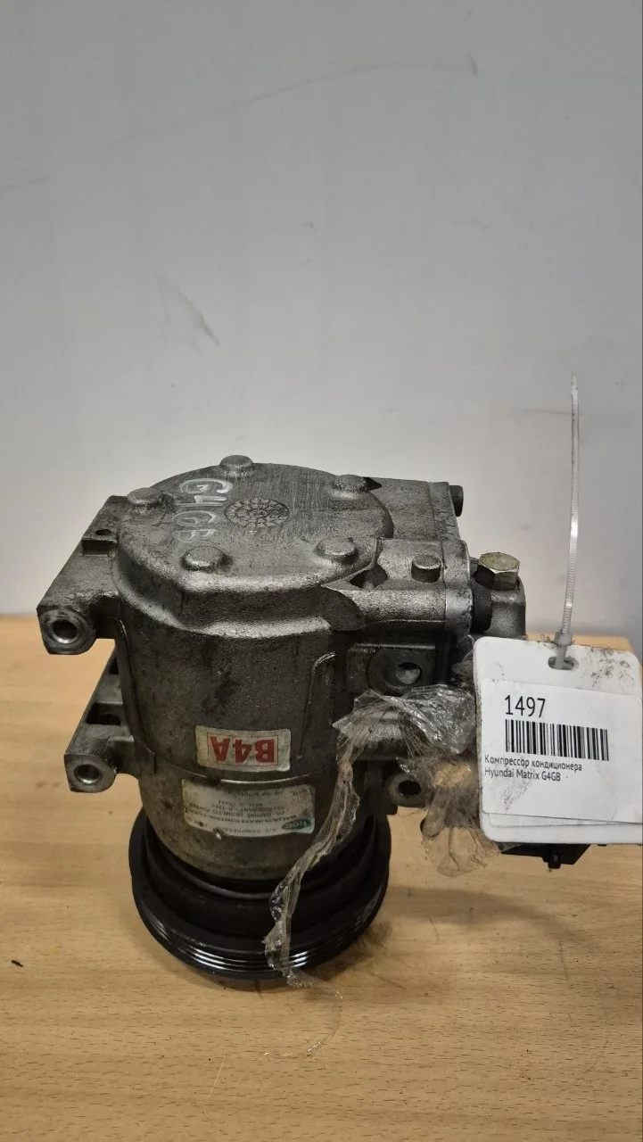 Компрессор кондиционера Hyundai Matrix 977012C100 G4GB
