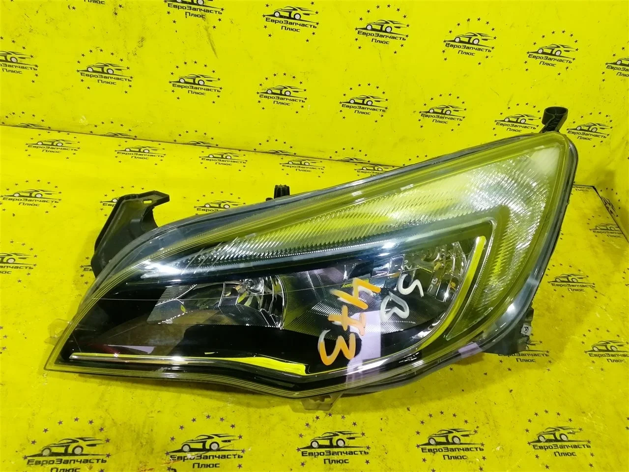 Фара Opel Astra 13371601 J, передняя левая