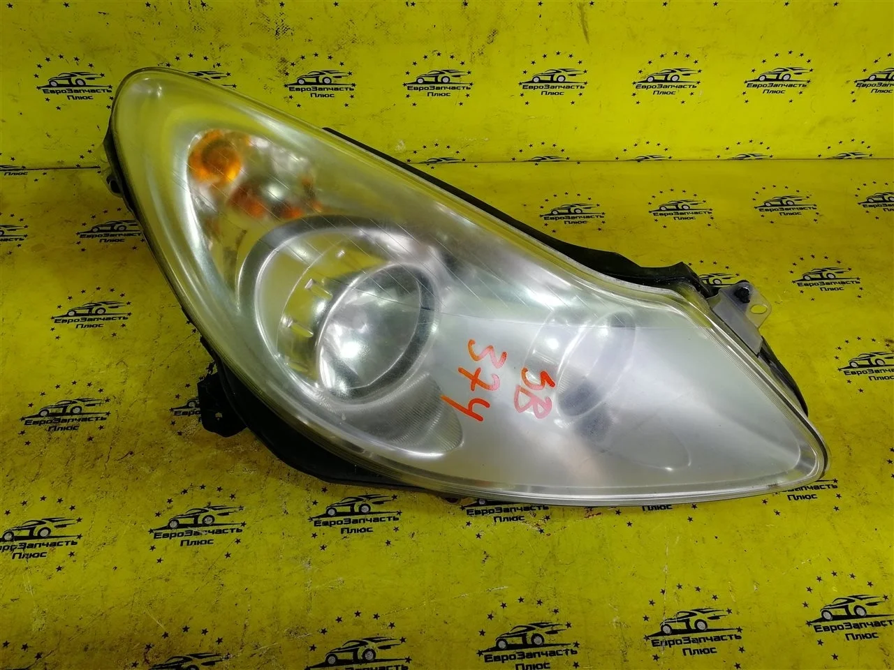 Фара Opel Corsa 13186384 D, передняя правая