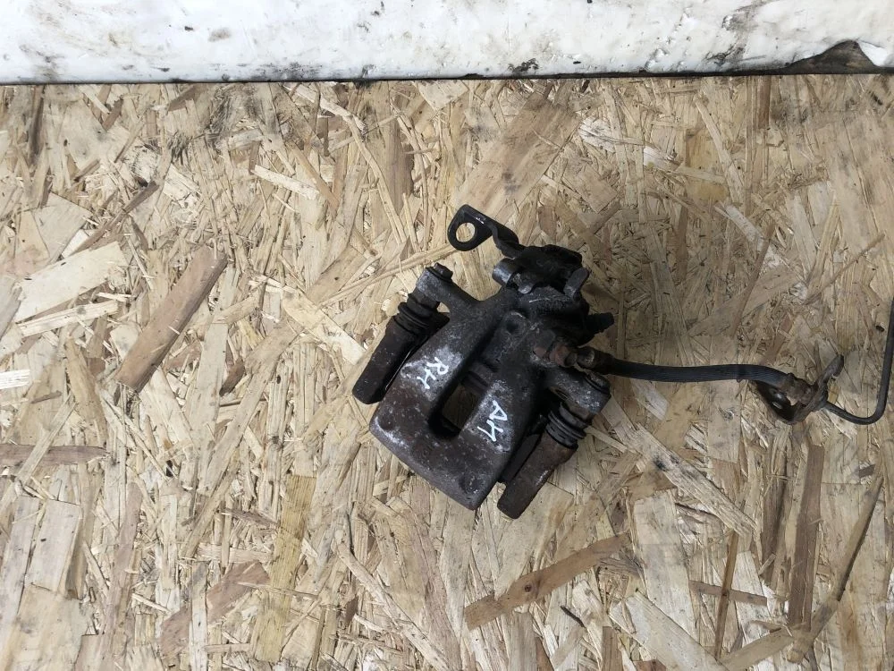 суппорт задний правый opel astra H