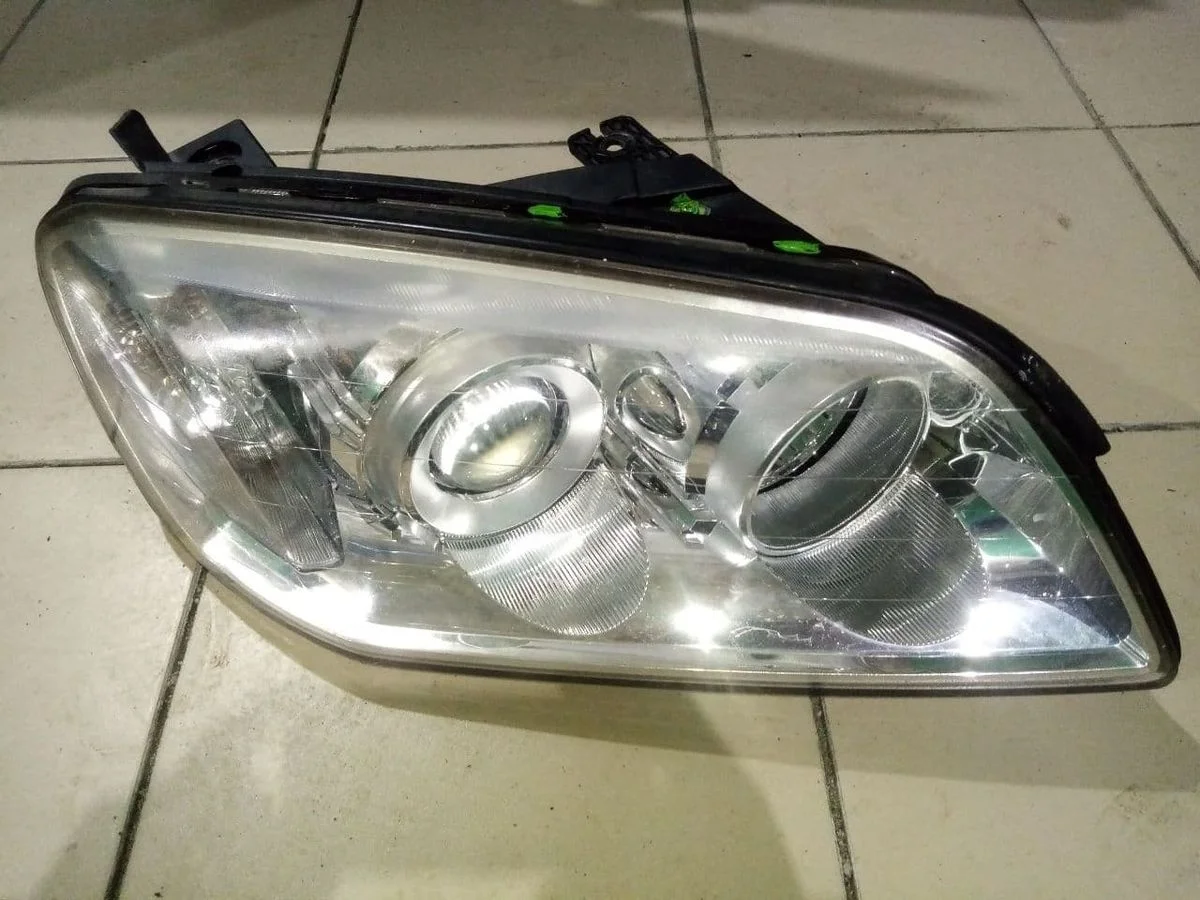Фара левая Chevrolet Captiva I (2006–2013)