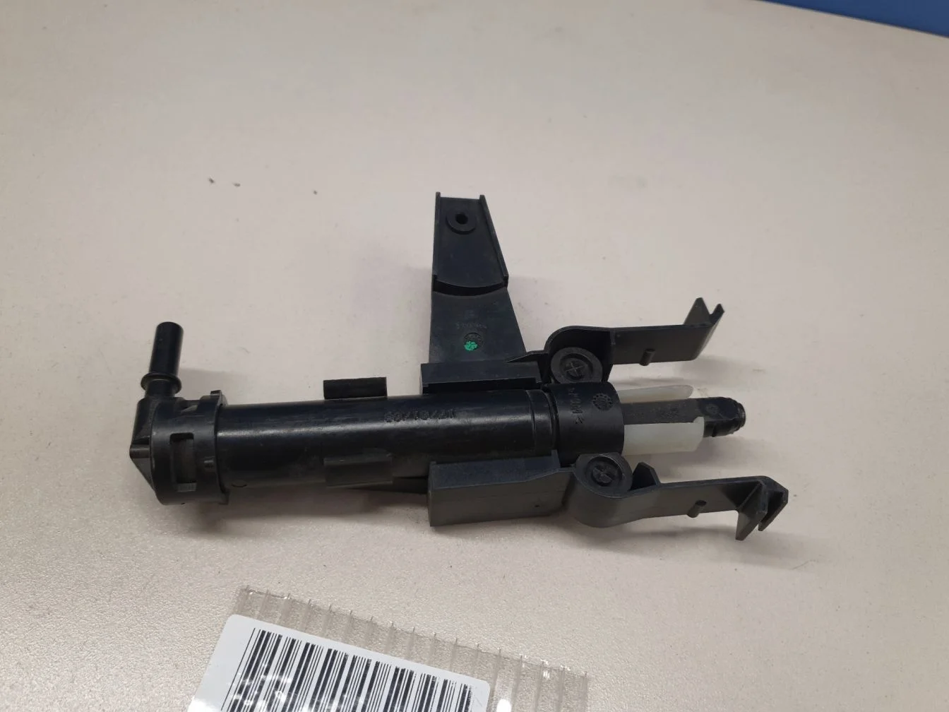 Форсунка омывателя фары правая для Opel Antara 2007-2015