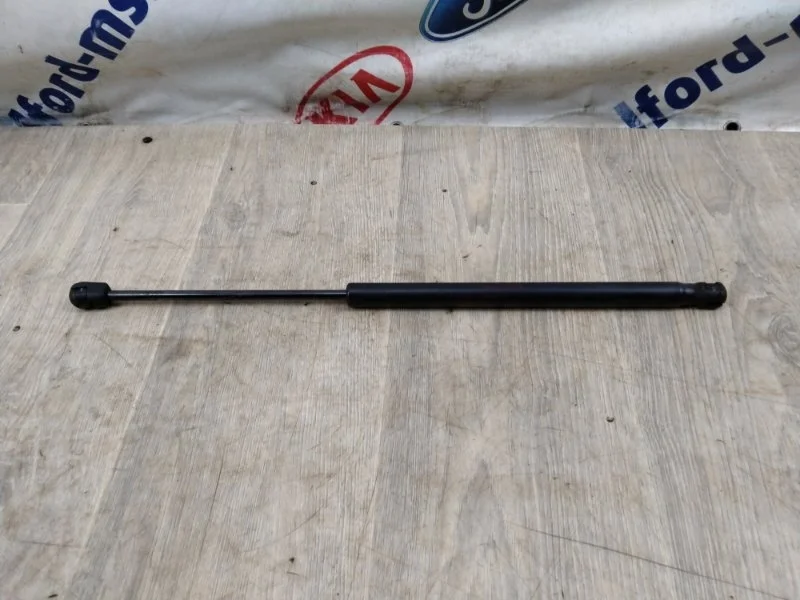 Амортизатор капота KIA SORENTO 2010г XM