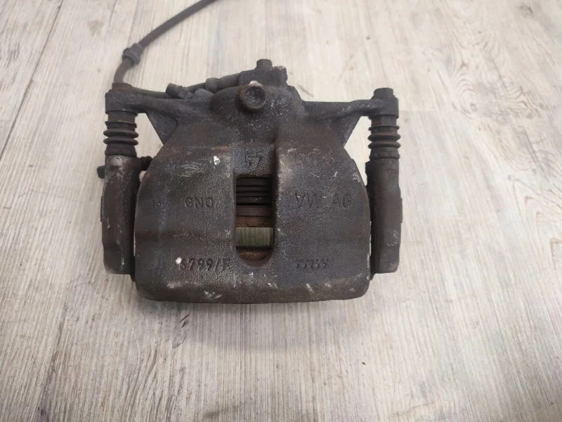 Суппорт тормозной VW Tiguan 2 2016- AD1